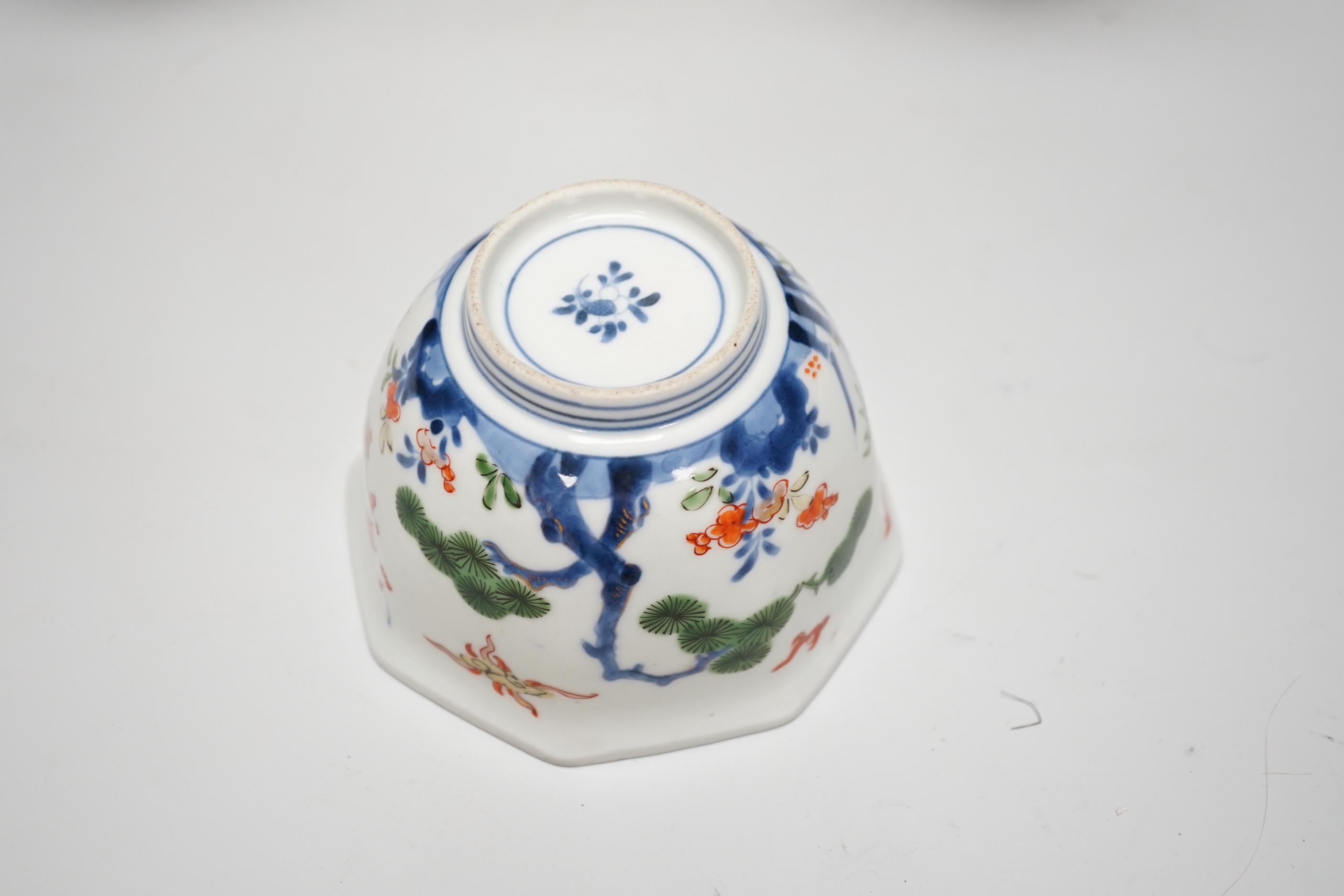 A Japanese Kakiemon bowl and three Satsuma pottery vases, tallest 24cm